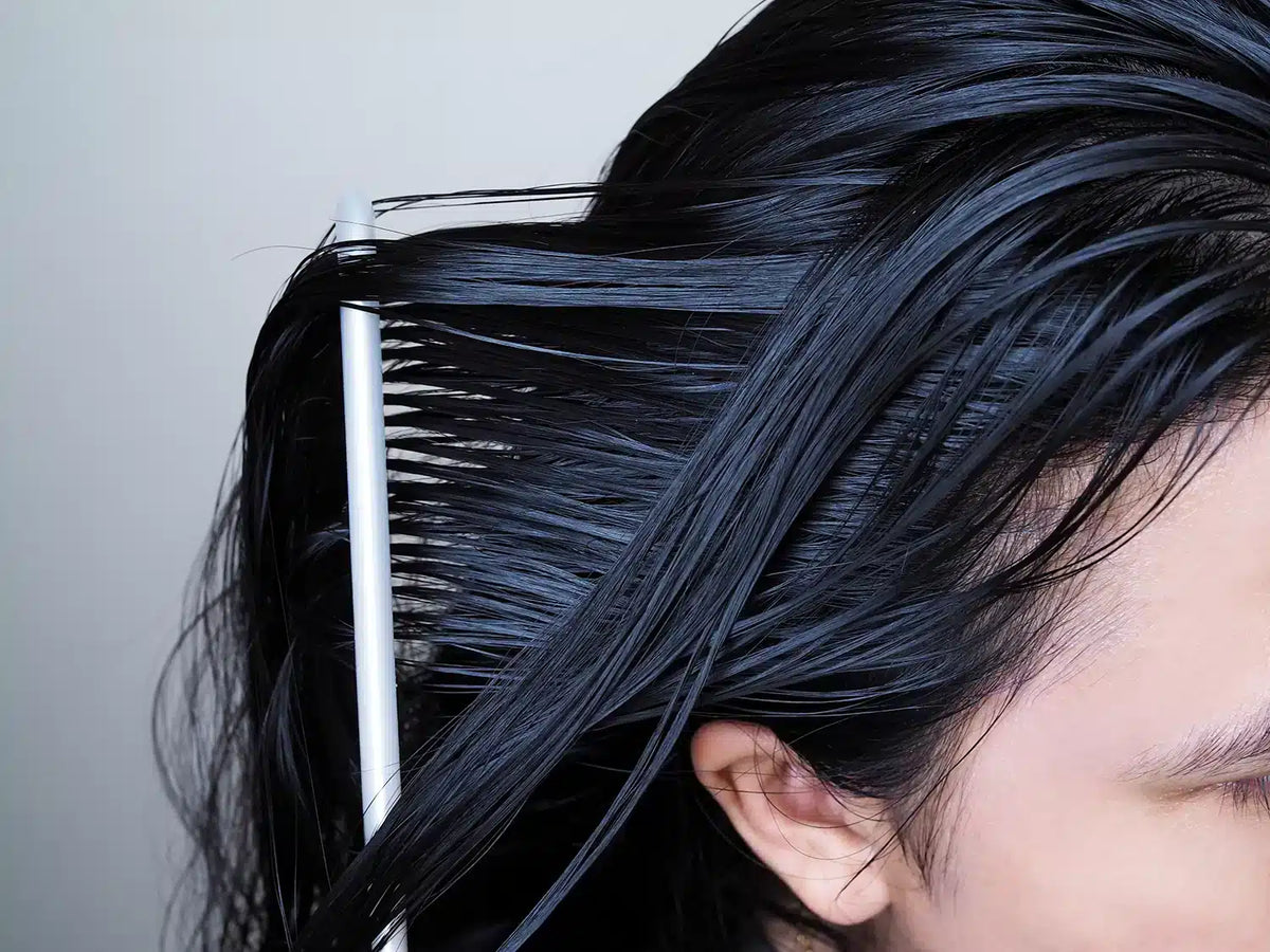 Close-up of a greasy, oily scalp