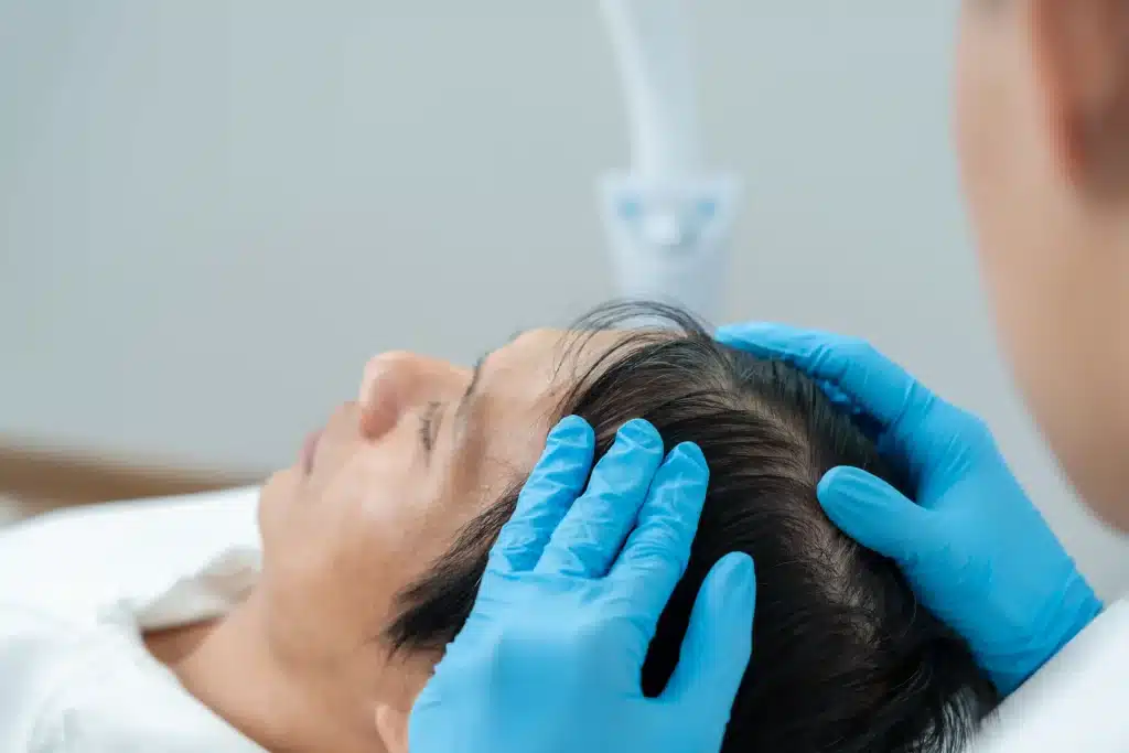 Man getting a scalp analysis for his dry scalp condition